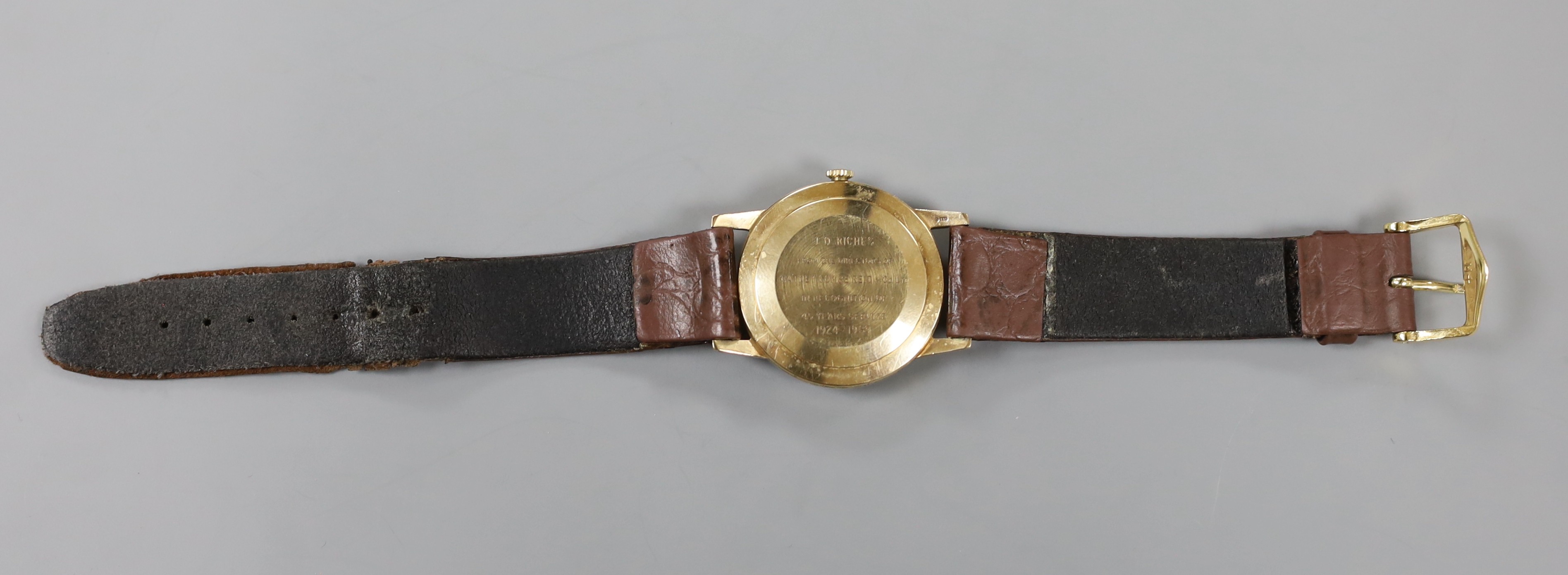 A gentleman's late 1960's 9ct gold Rolex precision manual wind wrist watch, with case back inscription, on associated leather strap, case diameter 34mm, gross weight 33.6 grams, with box and guarantee.
